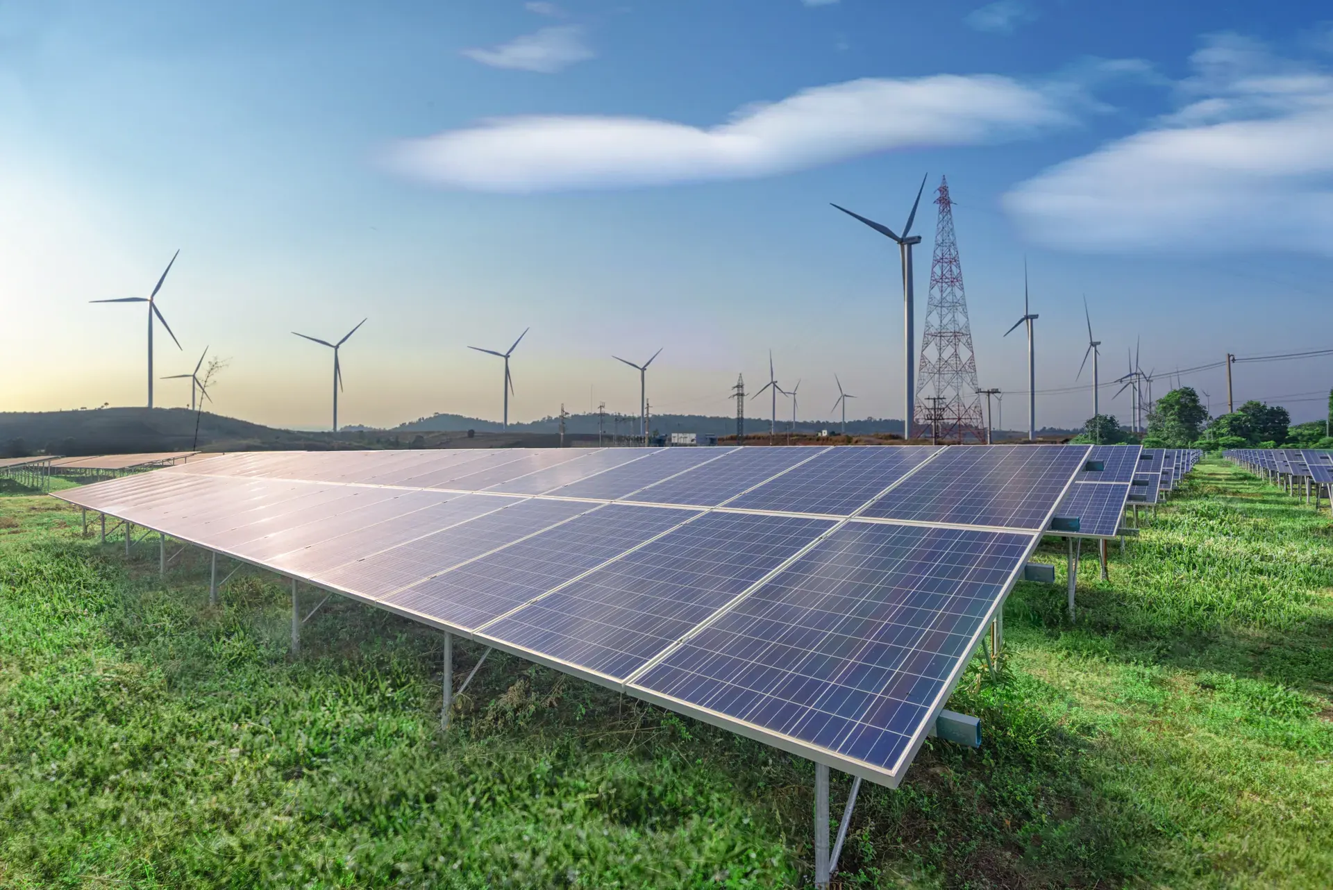Solar panels with wind turbines